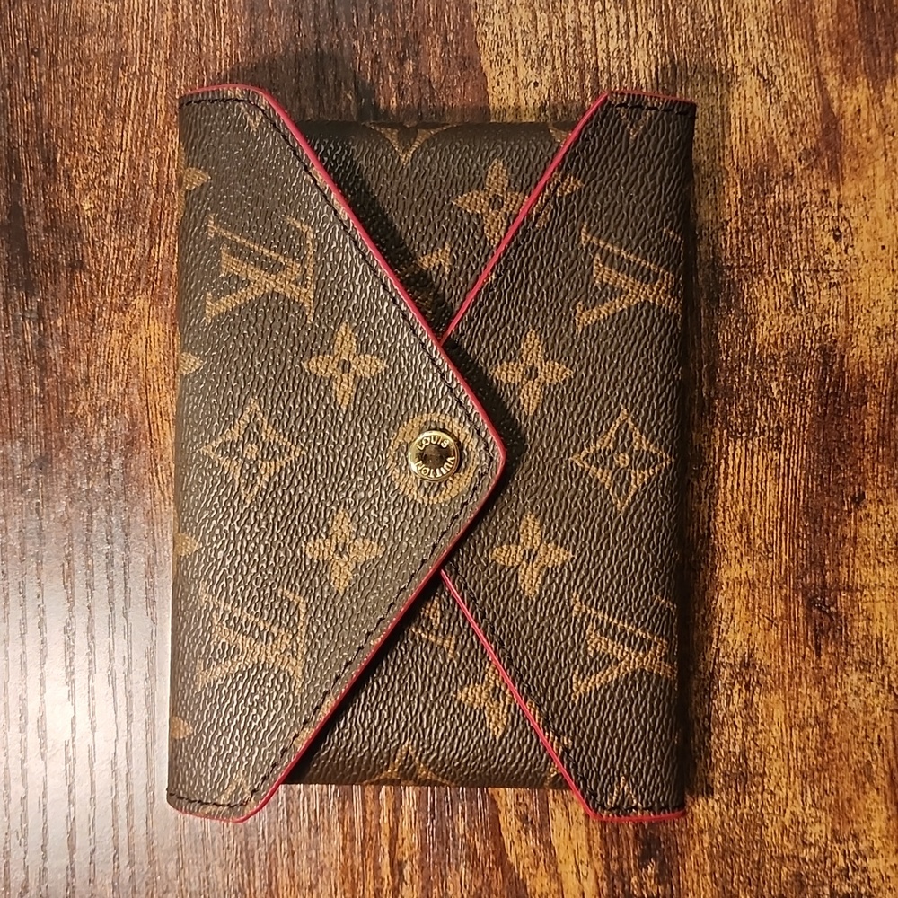 Pouch with red lining